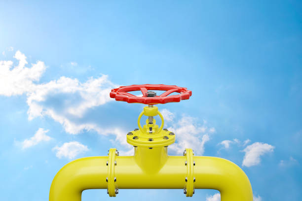 Gas Pipeline With A Valve Against The Blue Sky. Gas Pipeline With A Valve Against The Blue Sky.
